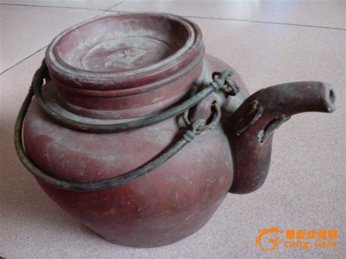 我有一把94年在宜兴买的方圆牌紫砂壶(当时90