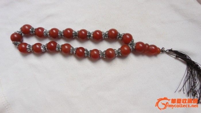 精致的银花片包红玛瑙佛珠。-精致的银花片包
