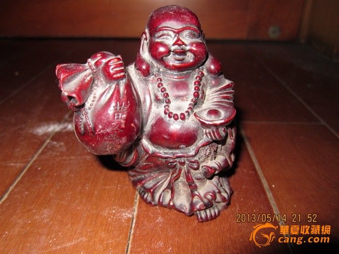 不知道是什么石质的的布袋和尚,放在手上有沉