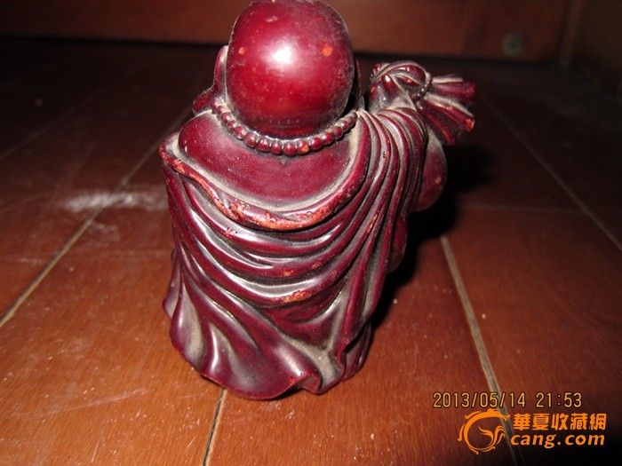 不知道是什么石质的的布袋和尚,放在手上有沉