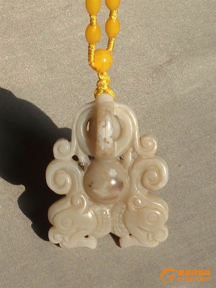 藏传佛教法器护身符镂空雕牌_藏传佛教法器护