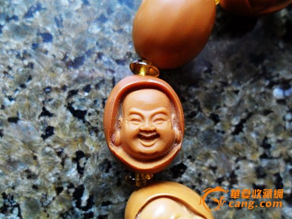 橄榄核雕笑面佛