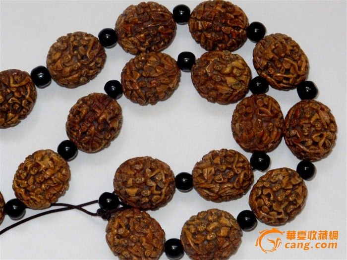 收来的桃核雕刻的十八罗汉串_收来的桃核雕刻