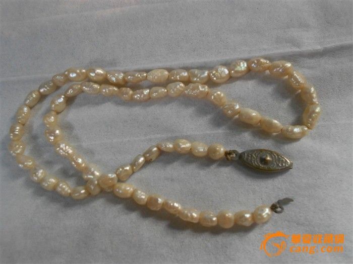 一串泛黄的老珍珠项链_一串泛黄的老珍珠项链