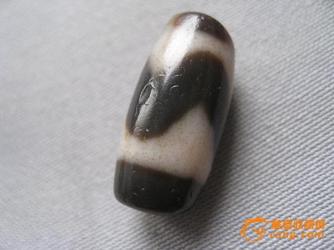 爆满朱砂的虎牙天珠_爆满朱砂的虎牙天珠价格_爆满朱砂的虎牙天珠图片_来自藏友飞云雅玩_玉石_地摊交易_华夏收藏网 cang.com