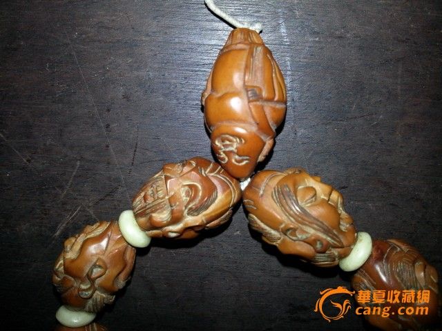 橄榄核刻花佛头手串_橄榄核刻花佛头手串价格