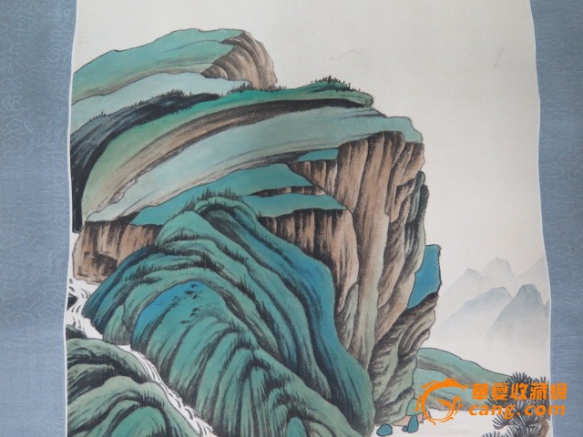 张大千绘青绿山水画